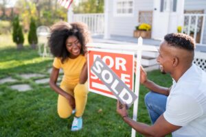 Young couple buying a house