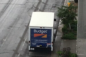Budget truck parked on the street