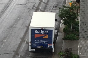 Budget truck parked on the street