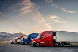 A fleet of large moving trucks, also known as a van line.