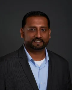 Professional headshot of Riaz Karim, Strategic Partnerships Manager for PODS Moving & Storage.