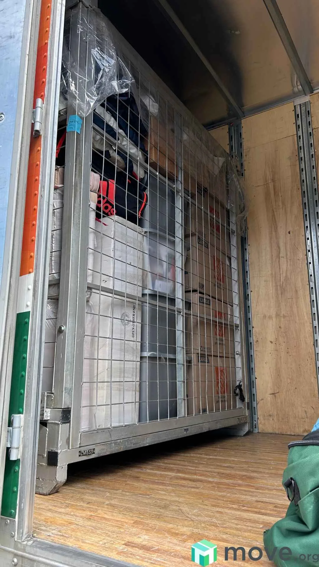 Interior of moving truck showing well-packed Zippy Shell moving container.